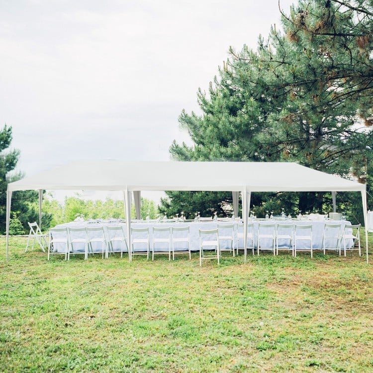 Large 10 x 30 feet canopy tent with removable sidewalls, ideal for outdoor parties and weddings, set on grassy ground.