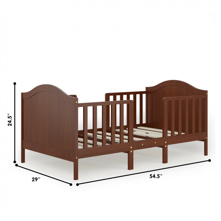 Classic convertible wooden toddler bed in brown with guardrails, measuring 54.5" x 29" for safe sleeping and play.