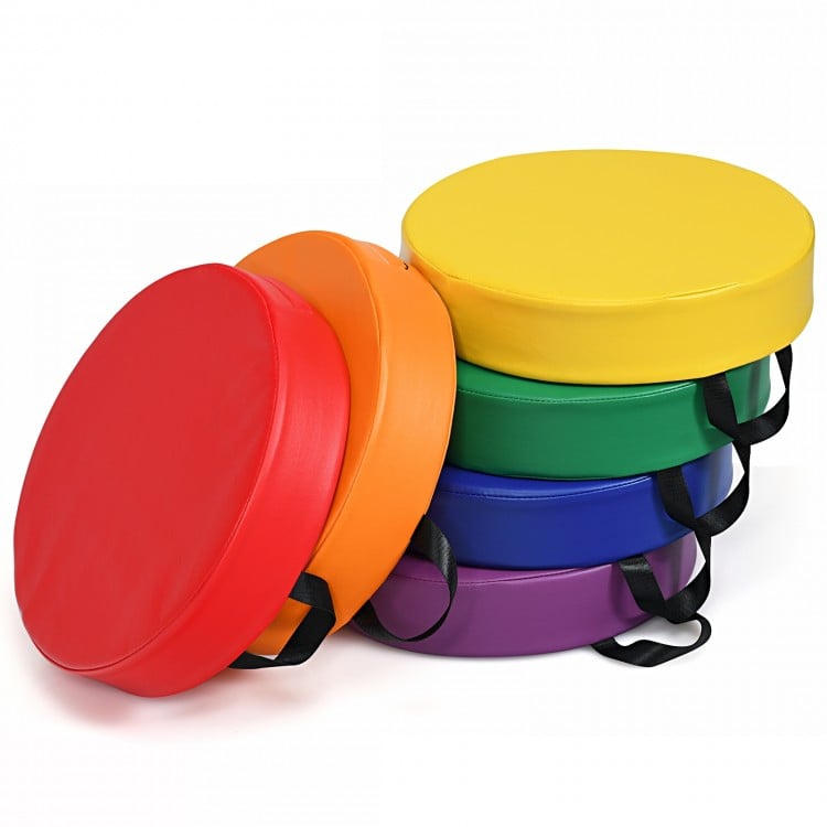 Multicolor 15-inch round toddler floor cushions with ergonomic handles, perfect for kids' comfort and color recognition.