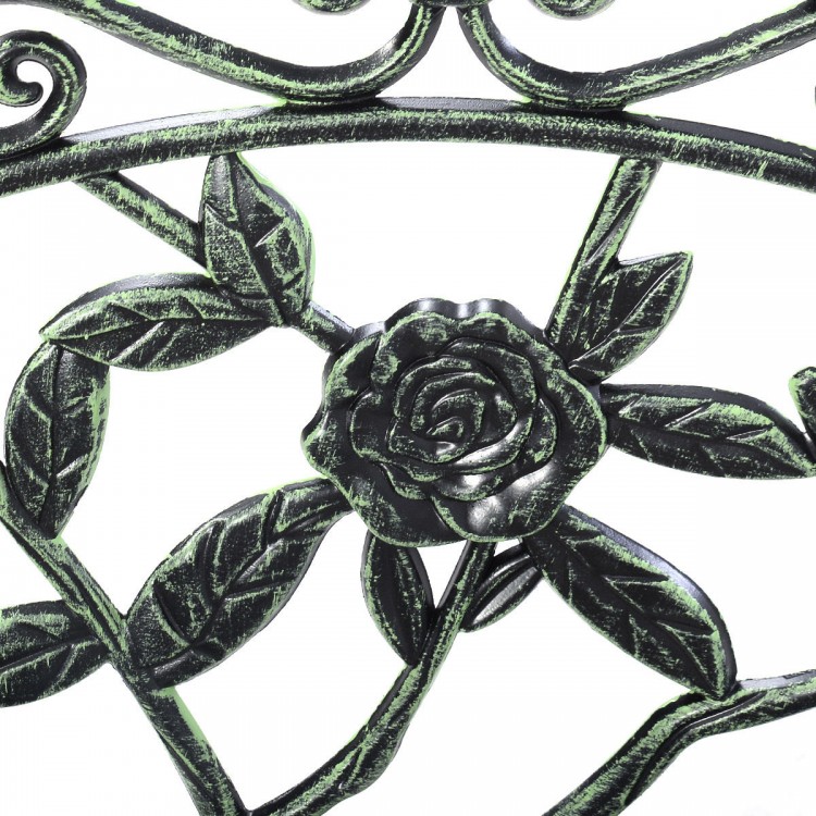 Close-up of the antique rose design on a cast aluminum patio bench in antique green, perfect for outdoor relaxation.