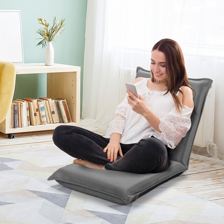 Gray adjustable floor chair in a relaxed position, featuring 6 customizable settings for ultimate comfort and.