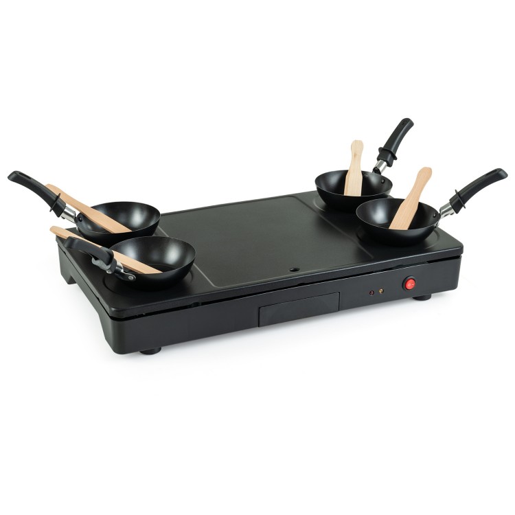 Electric grill griddle with 4 nonstick woks and wooden spatulas, ideal for making pancakes and frying eggs easily.