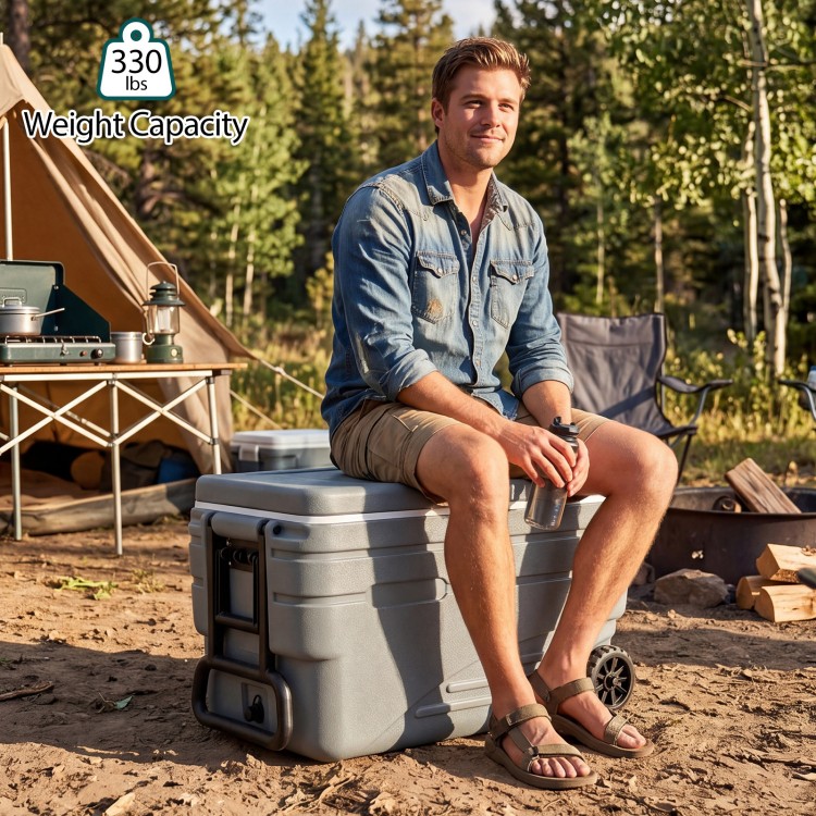 Gray 103 Quart outdoor portable wheeled ice cooler with foldable handles, designed for easy transport and ice retention.