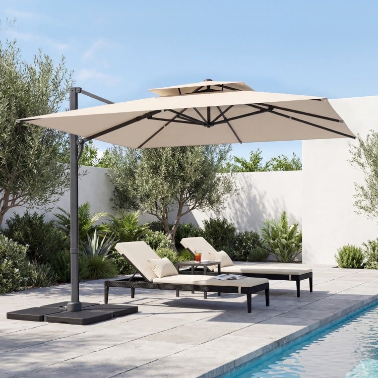 Beige 10 FT cantilever umbrella with aluminum pole and 220 lbs base, ideal for outdoor patio shading.