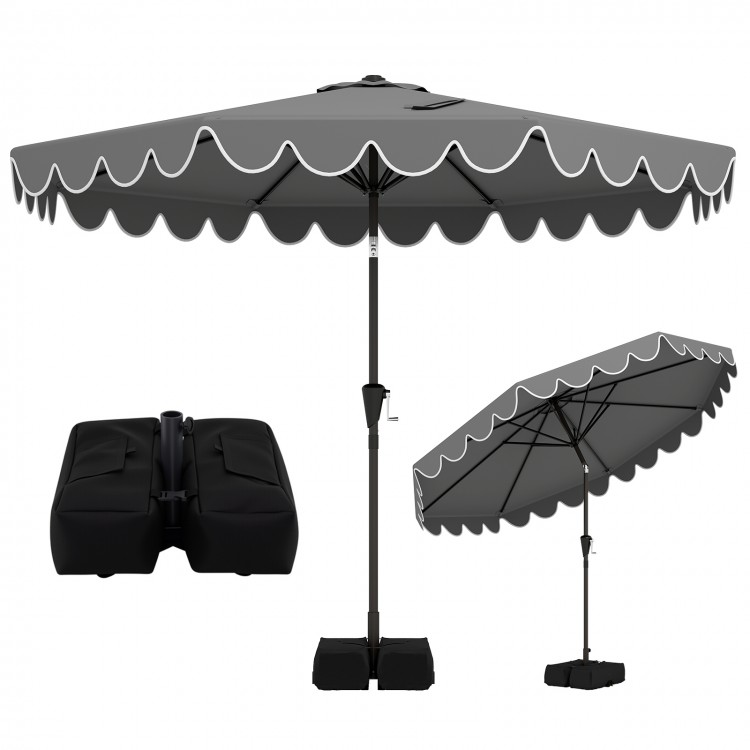 10-foot gray patio umbrella with ruffled edges, weighted base, and sandbags for stability, ideal for outdoor gatherings.