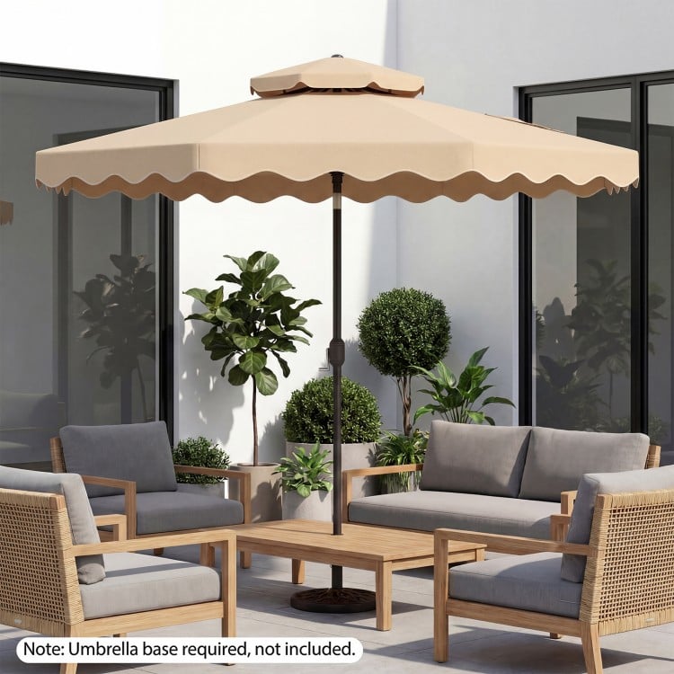 10-foot beige patio umbrella with push-button tilt and crank, providing broad shade for outdoor gatherings.