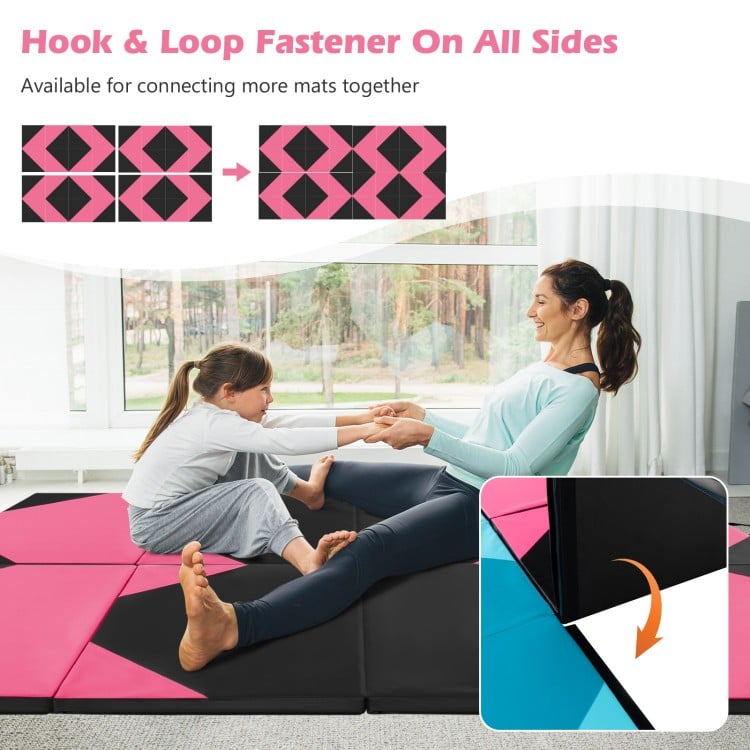 Folding exercise mat in black and pink, featuring hook and loop fasteners, ideal for kids' play and various workouts.