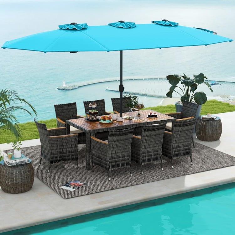 10-piece patio wicker dining set featuring a turquoise double-sided umbrella, ideal for outdoor gatherings by the pool.