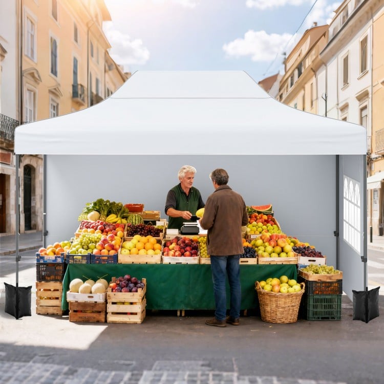 Pop up canopy tent in white, 10x14 ft, providing sunshade for outdoor markets with sidewalls and strong support.