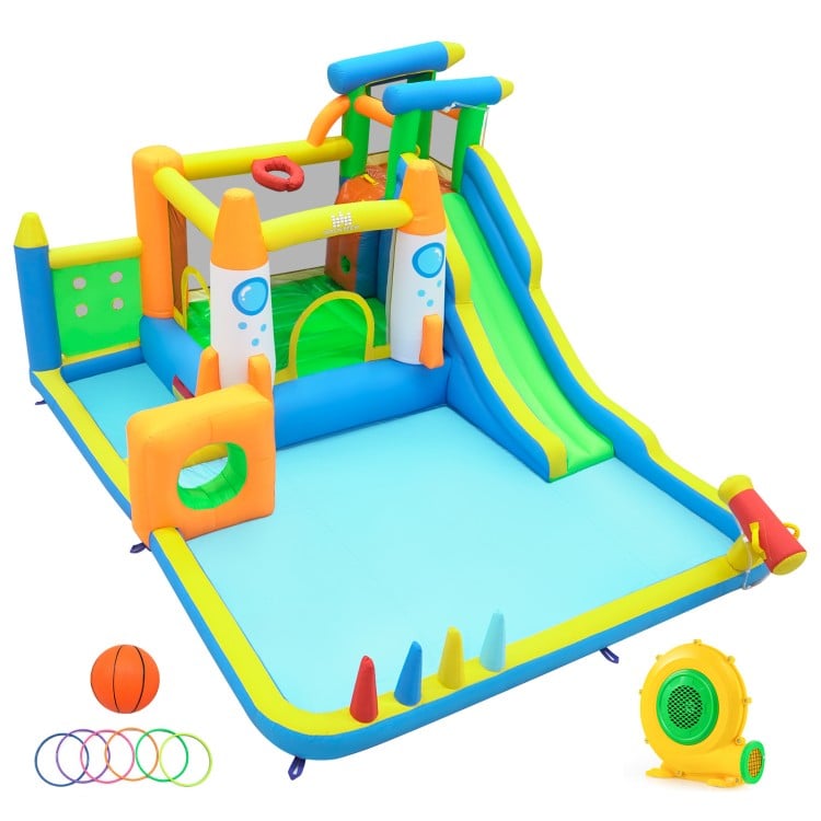 Colorful 10-in-1 inflatable bounce house with water slide, climbing wall, and basketball hoop for outdoor summer fun.