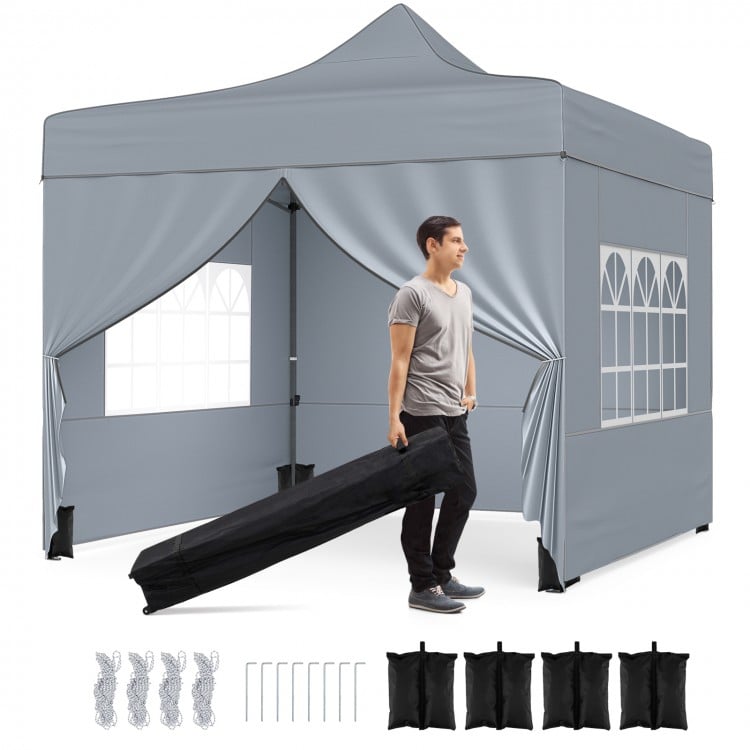 Pop-up canopy tent with gray fabric, removable sidewalls, and wheeled bag, ideal for outdoor events and parties.