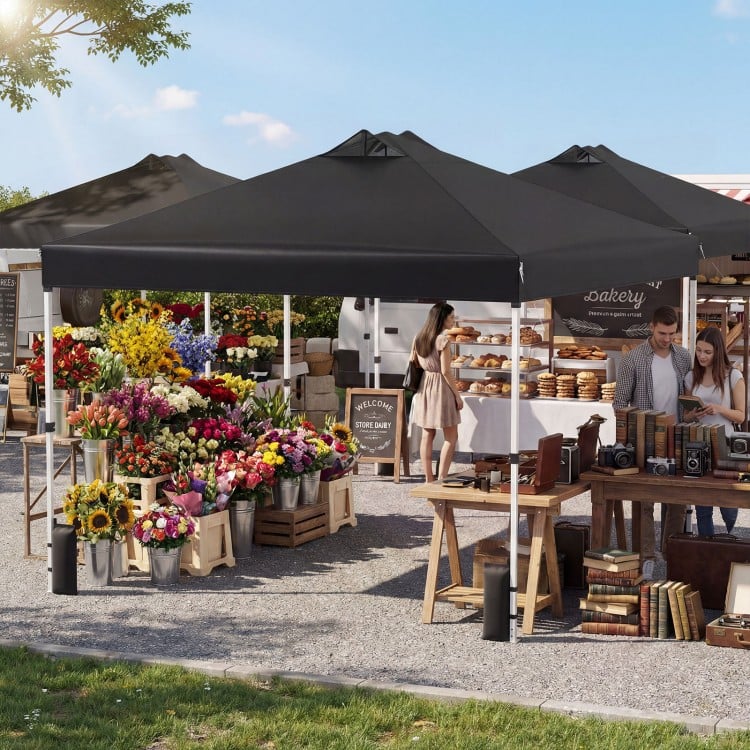 Black 10 x 10 feet outdoor commercial pop-up canopy tent with sturdy steel frame, ideal for outdoor activities and.