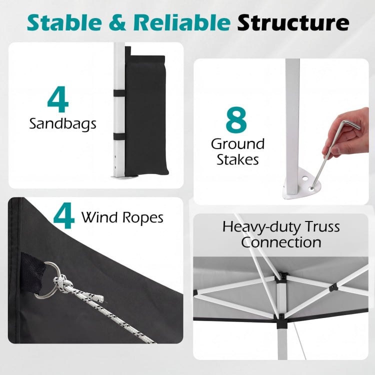 Stable structure details of the 10 x 10 feet black pop-up canopy tent with sandbags, stakes, wind ropes, and truss.