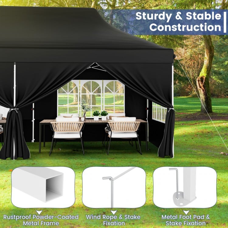 10 x 20 FT black pop-up canopy with windows and sidewalls, featuring a sturdy metal frame for outdoor events.
