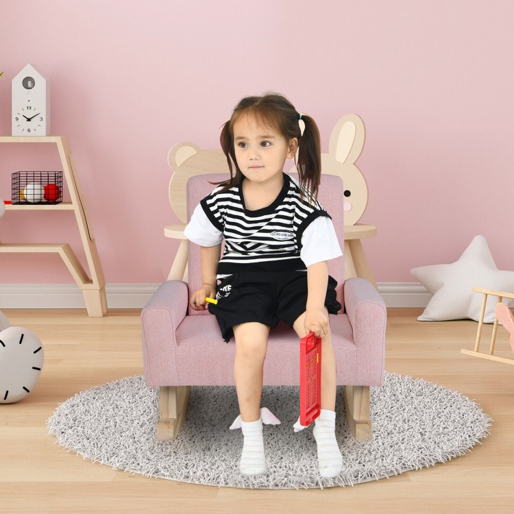 Kids rocking chair in pink with solid wood legs, featuring a spacious seat and ergonomic design, perfect for playtime.