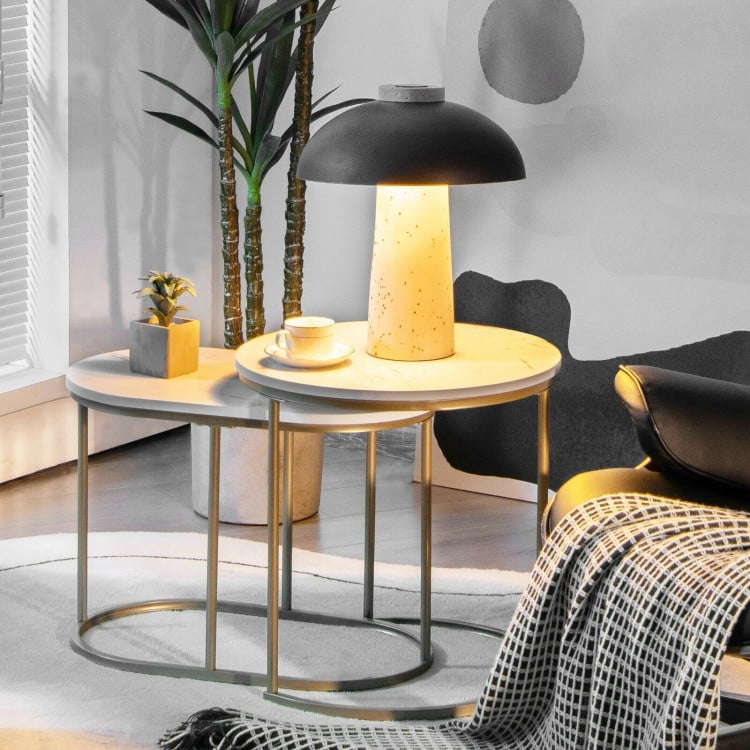 Modern nesting coffee table set of 2 in white with sturdy steel frame, perfect for compact living spaces.