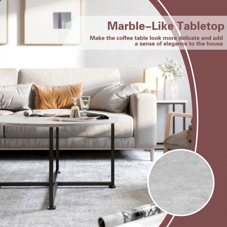 Round faux marble coffee table from a 3-piece set with X-shaped steel base, perfect for living room elegance.