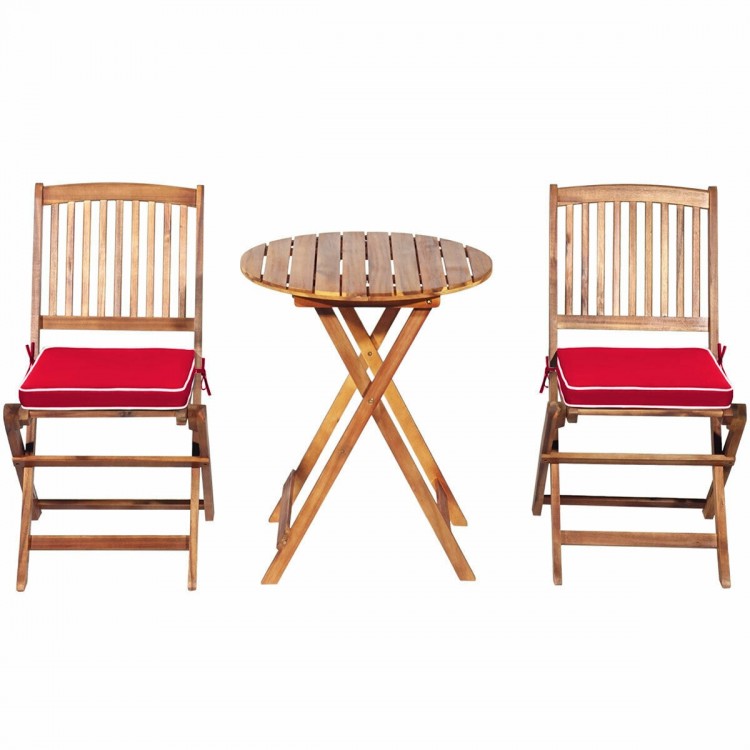 Folding wooden bistro set with cushioned red chairs and round table, made of solid acacia wood for outdoor use.