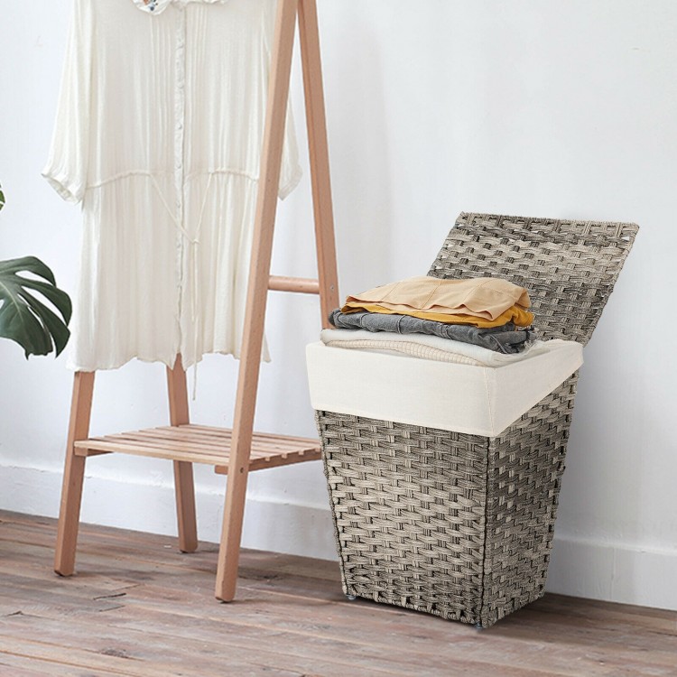 Handwoven gray laundry hamper with removable liner, flip lid, and non-slip foot pads for stability in any room.