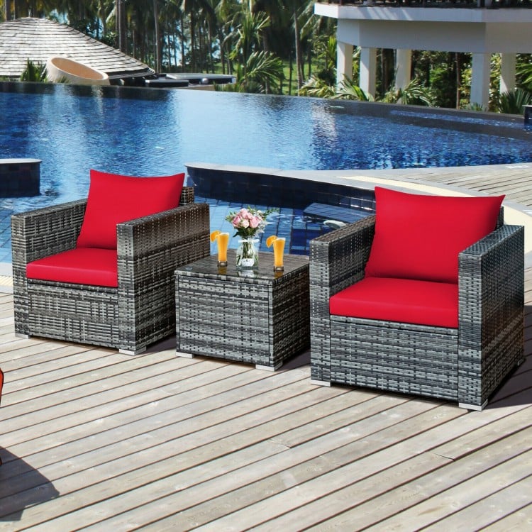 Tempered glass-top coffee table from the 3-piece patio rattan furniture set, ideal for drinks and snacks outdoors.