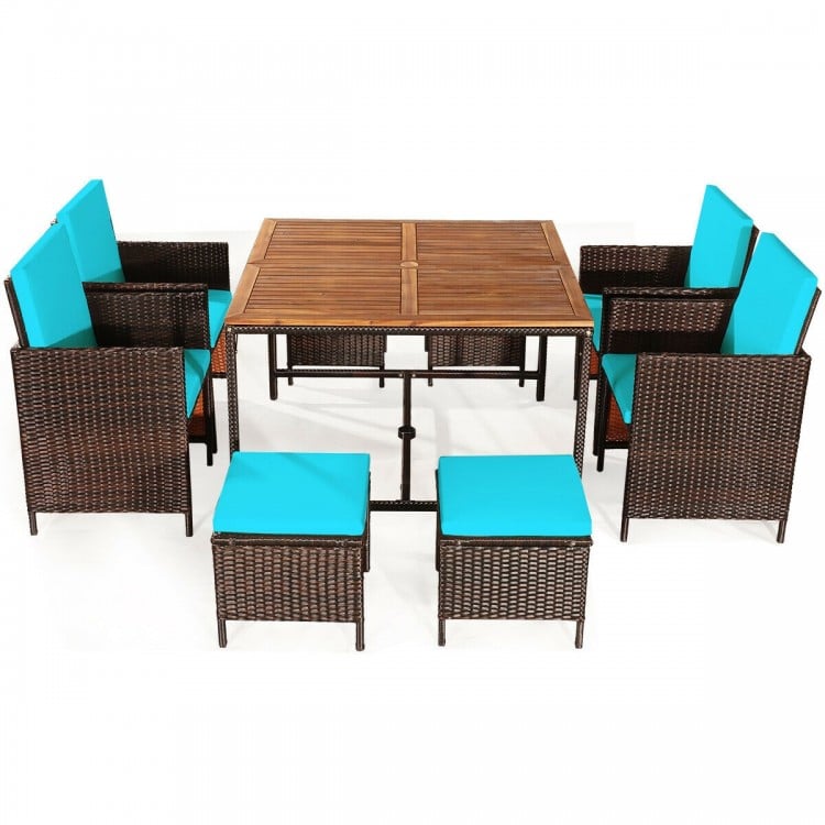 9-piece patio dining set with turquoise cushioned chairs and acacia wood tabletop, perfect for outdoor gatherings.