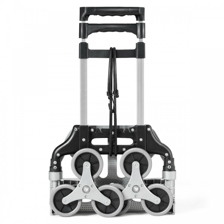 Portable folding stair climbing hand truck with three-wheel design and adjustable handle for easy transport of luggage.