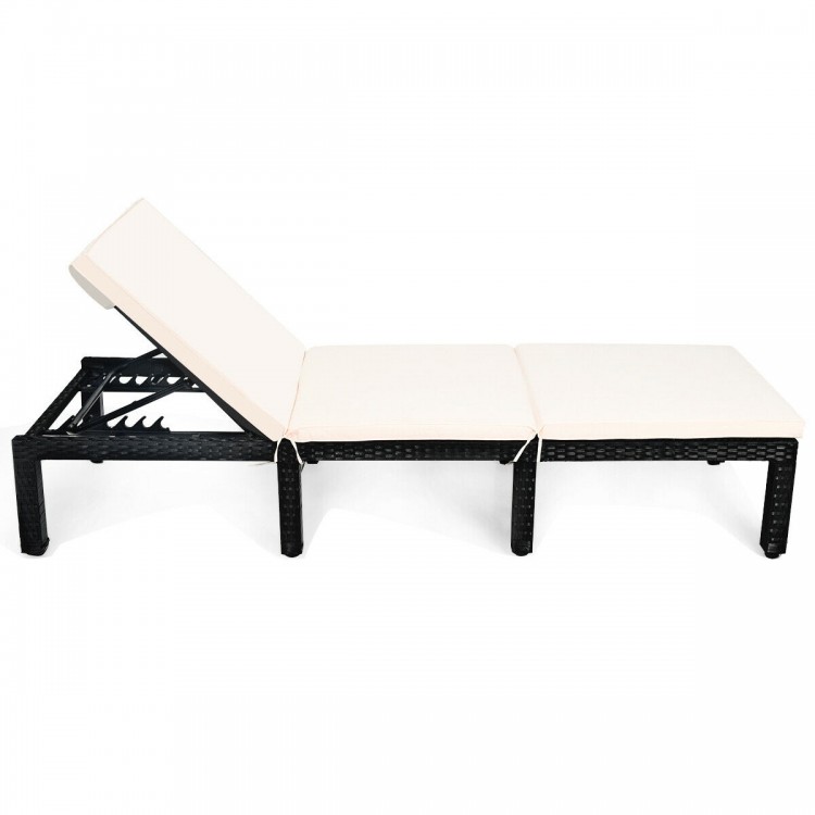Height adjustable rattan lounge chair with white cushion, ideal for patio and poolside relaxation.