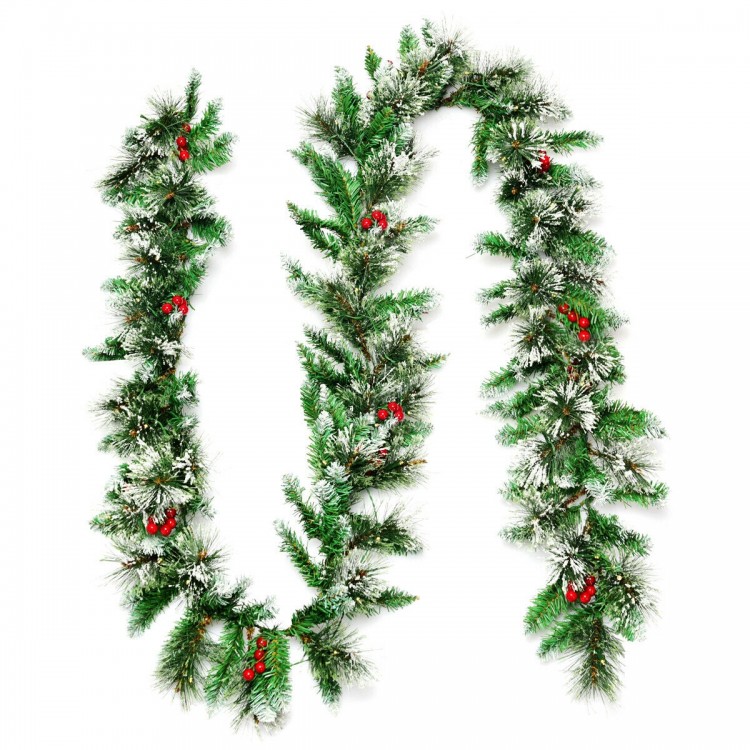 9-foot pre-lit Christmas garland with snow flocked tips and red berries, perfect for indoor or outdoor festive.