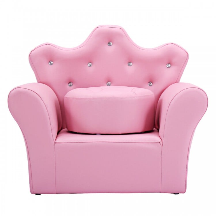 Children's pink upholstered princess sofa with a round ottoman, featuring diamond accents, perfect for leisure and.