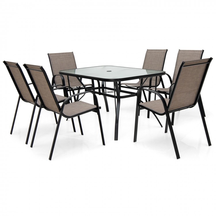 7-piece patio dining set featuring a rectangular tempered glass table and 6 stackable chairs for outdoor gatherings.