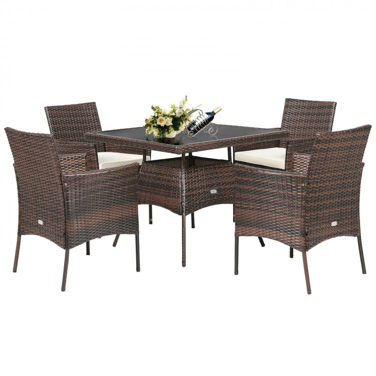 Square dining table from the outdoor 5 pieces set, featuring a durable glass top and sturdy PE rattan for stylish patio.