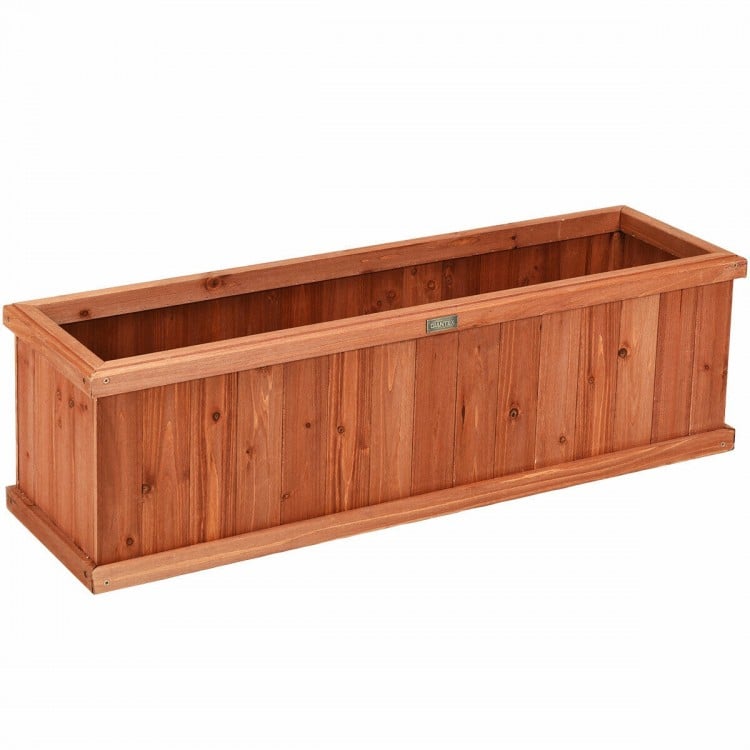 Long wooden decorative planter box made of natural fir, ideal for indoor or outdoor gardening and enhancing window.
