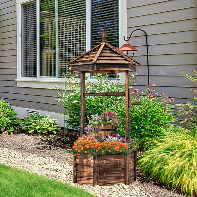 Rustic wooden wishing well planter with hexagonal roof, adjustable bucket, and climbing poles for versatile outdoor.