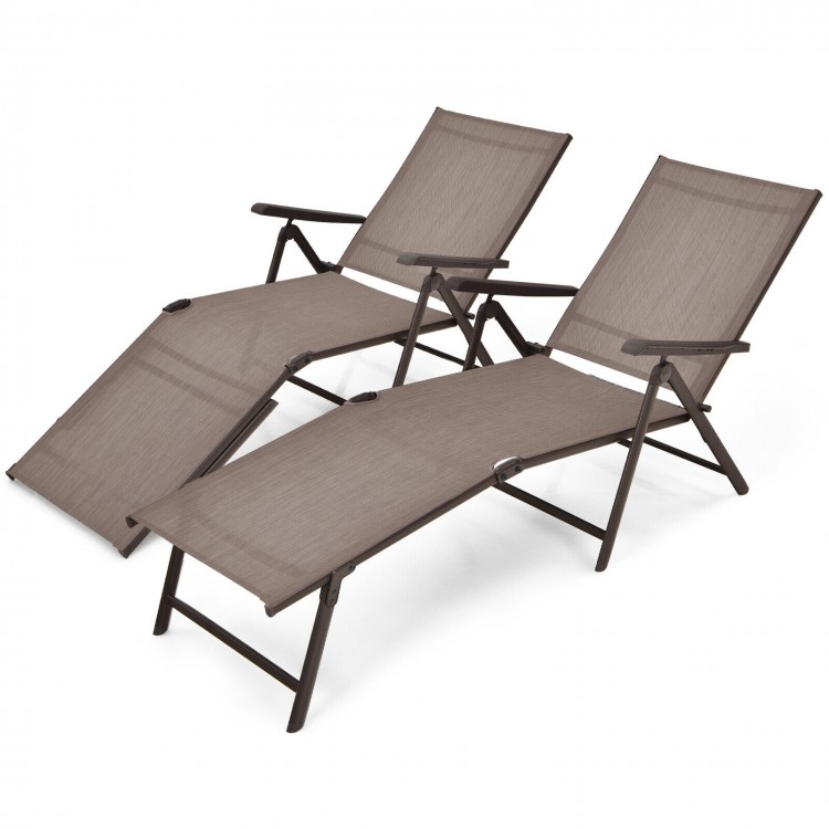 Two foldable chaise lounge chairs in brown with adjustable backrest and footrest, perfect for outdoor relaxation.