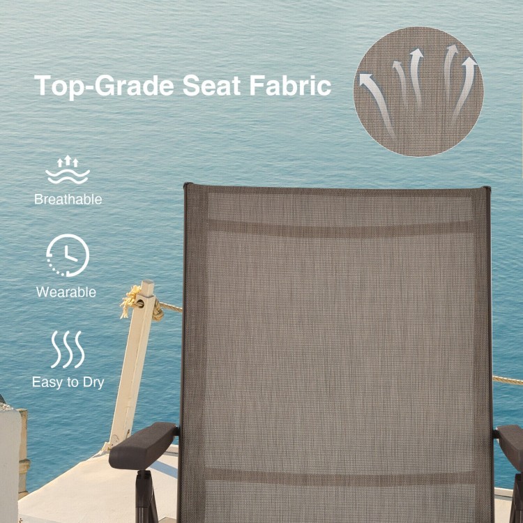 Close-up of the breathable fabric on a brown foldable chaise lounge chair, ideal for outdoor relaxation and travel.