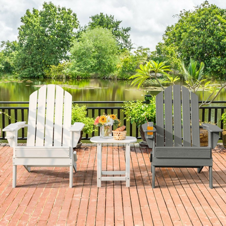 Two foldable gray patio chairs with built-in cup holders, set by a serene lake for outdoor relaxation.