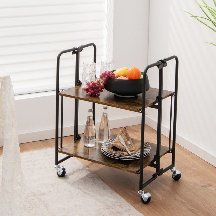 2-tier folding rolling cart with metal frame, rustic wood finish, ideal for kitchen or living room organization.