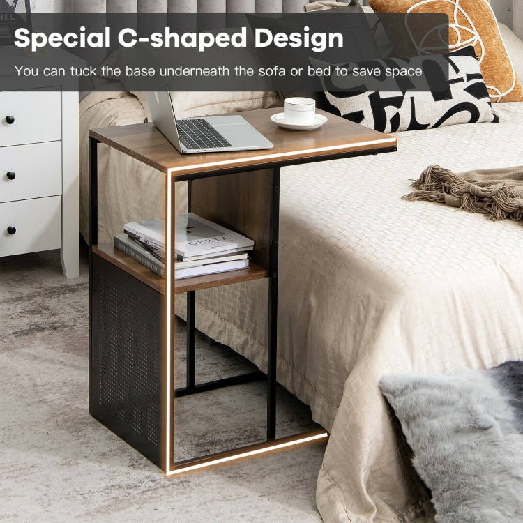 C-shaped side table with oak tabletop and black steel frame, perfect for saving space beside a sofa or bed.