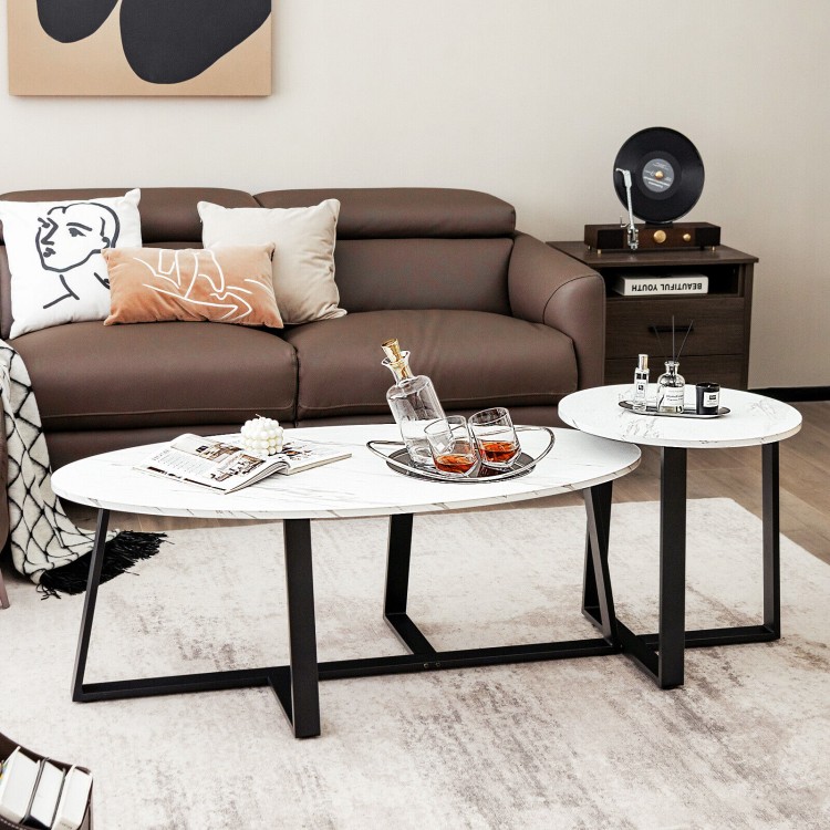 Modern faux marble nesting coffee table set with oval and round tables, featuring a stylish design for living room use.
