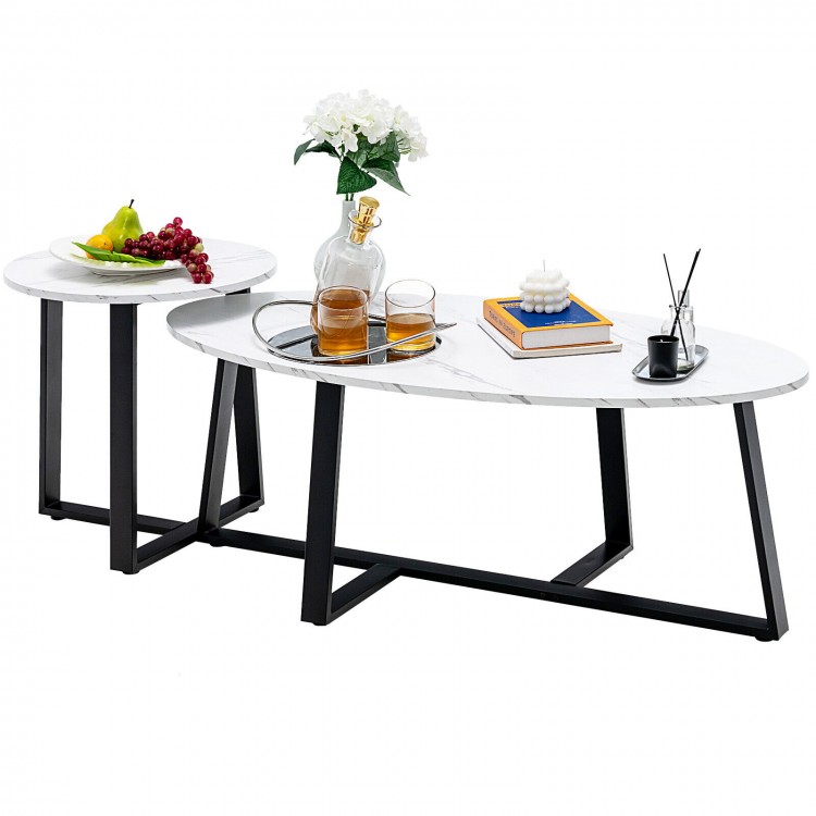 Set of 2 modern faux marble nesting coffee tables with oval and round tops, featuring black steel legs for stability.