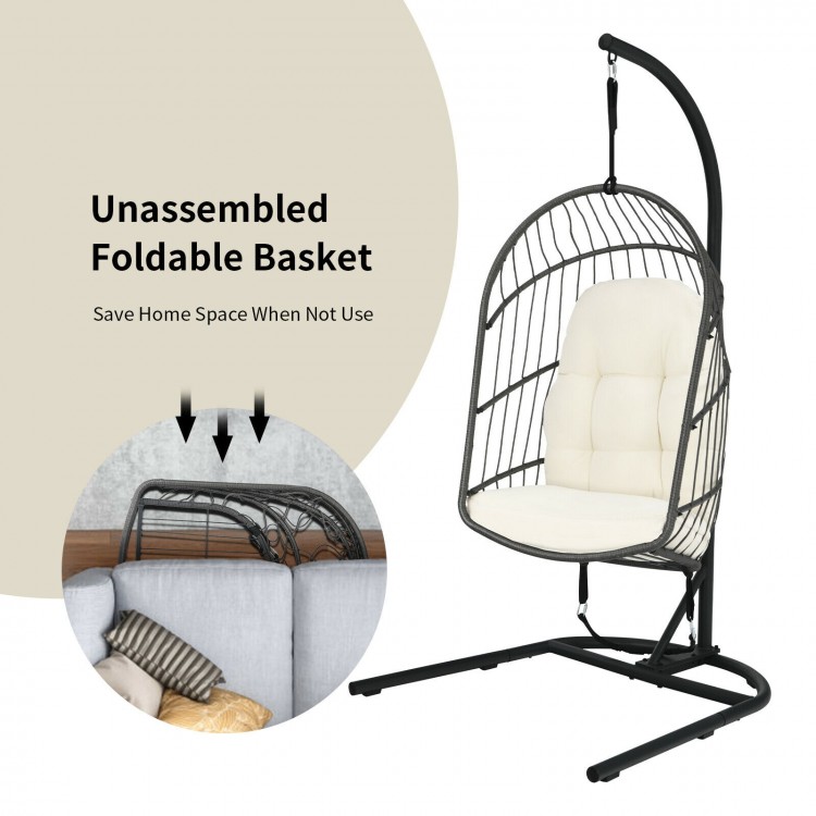 Hanging wicker egg chair with stand in beige, featuring a sturdy steel frame and comfortable cushions for indoor or.
