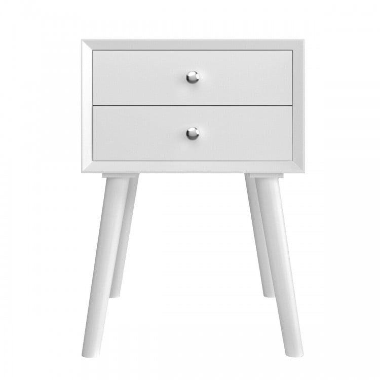 White wooden nightstand with two storage drawers, featuring a sturdy design and retro style for efficient space use.