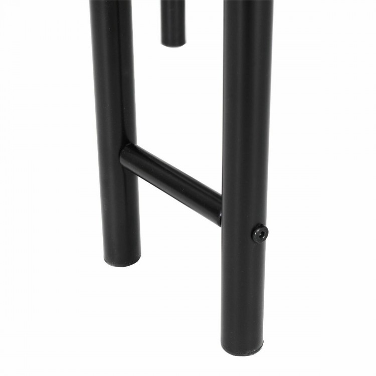 Close-up of the sturdy iron frame of the dining table set, showcasing the non-skid feet and horizontal support pipes.