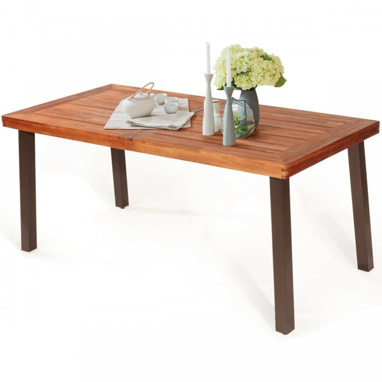 Rectangular acacia wood dining table showcasing a rustic finish and steel legs, perfect for stylish indoor or outdoor.