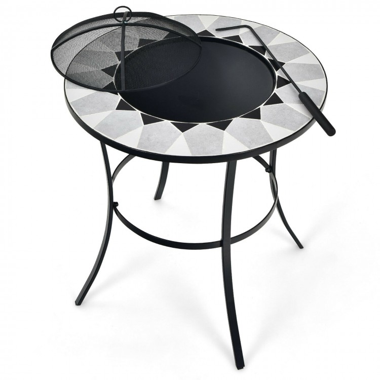 Round fire pit table with mesh cover and fire poker, featuring a durable steel frame and decorative patterns for.