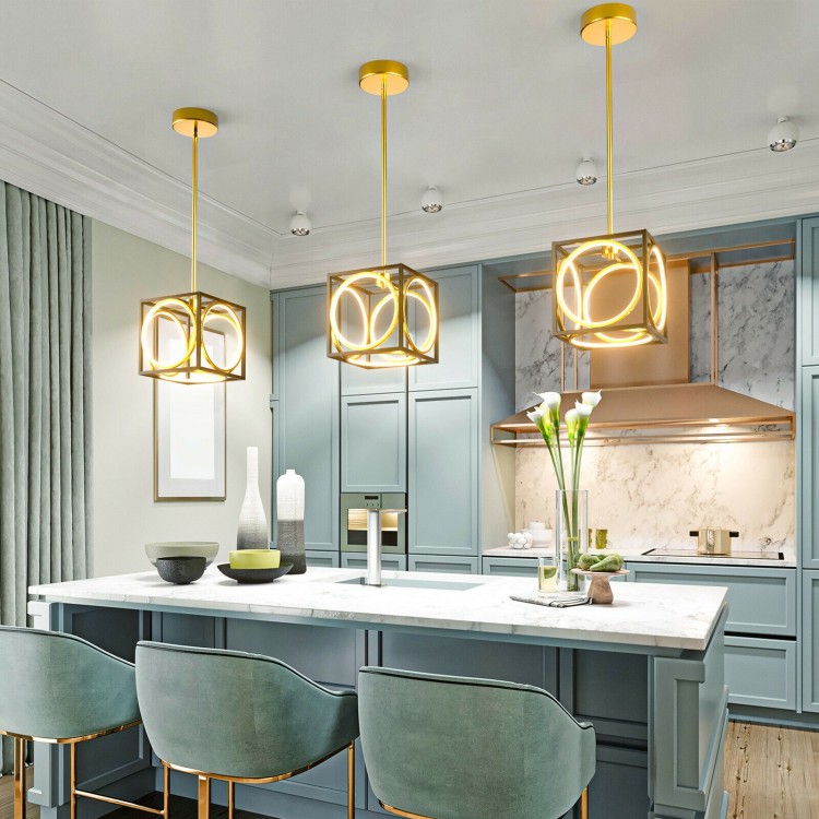 Modern LED pendant light in golden finish, featuring adjustable suspension, ideal for kitchen or living room decor.