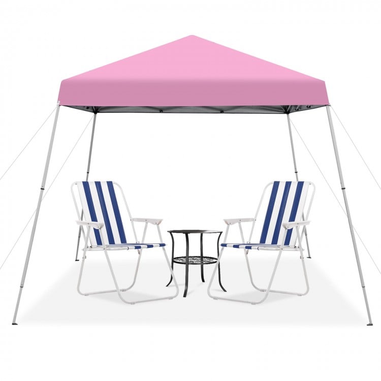 Outdoor instant pop-up canopy in pink with two striped chairs and a table, perfect for camping and gatherings.