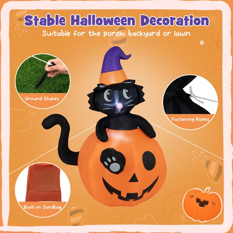 5-foot inflatable Halloween pumpkin with a black cat, featuring LED lights, sandbags, and ground stakes for stability.