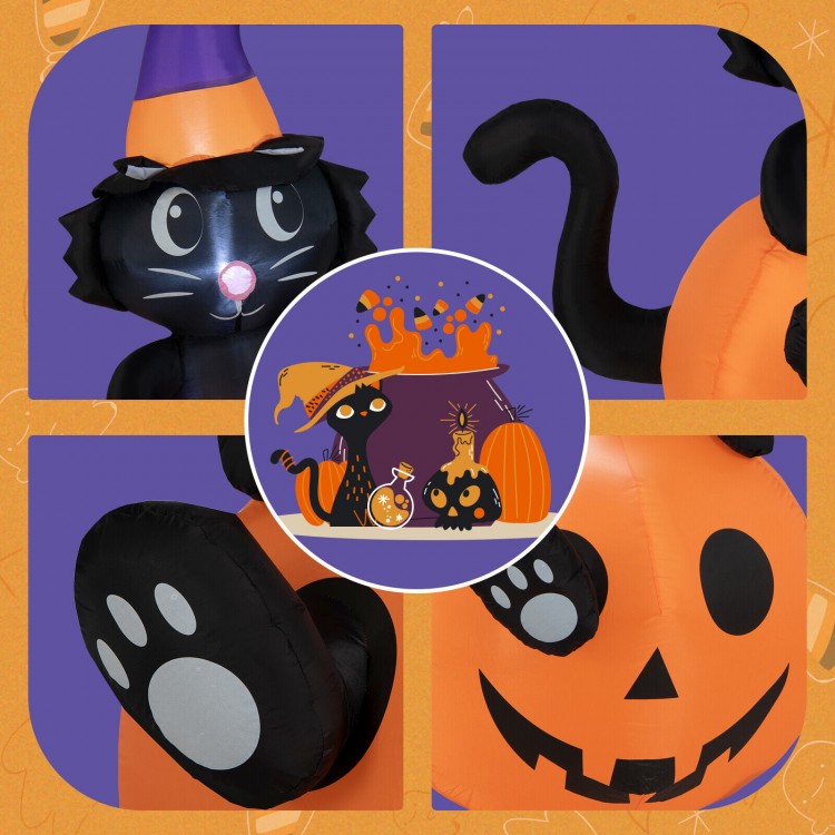 Close-up of the inflatable black cat's face, featuring a playful expression and a witch's hat, perfect for Halloween.
