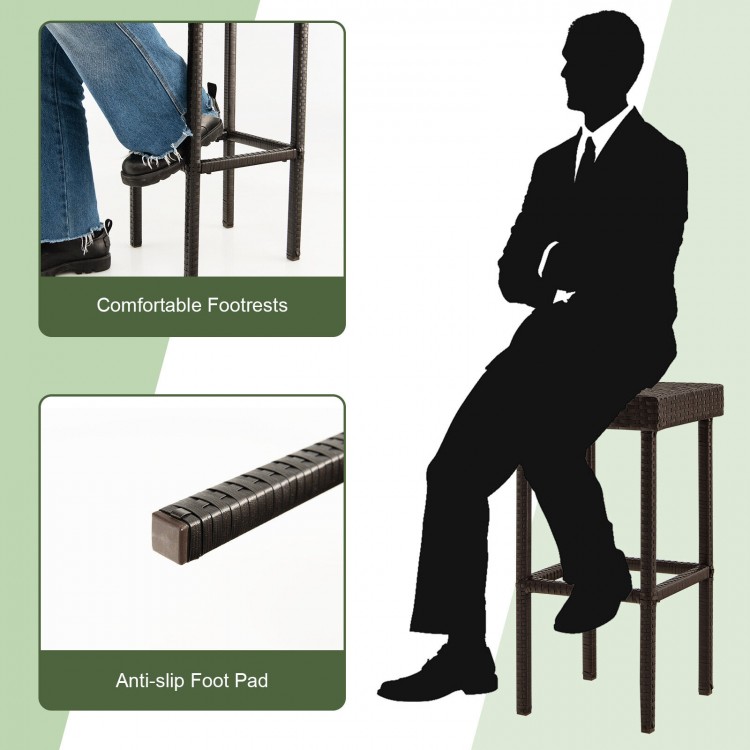 Brown rattan bar stool with comfortable footrest and anti-slip foot pad, ideal for outdoor patio and backyard use.